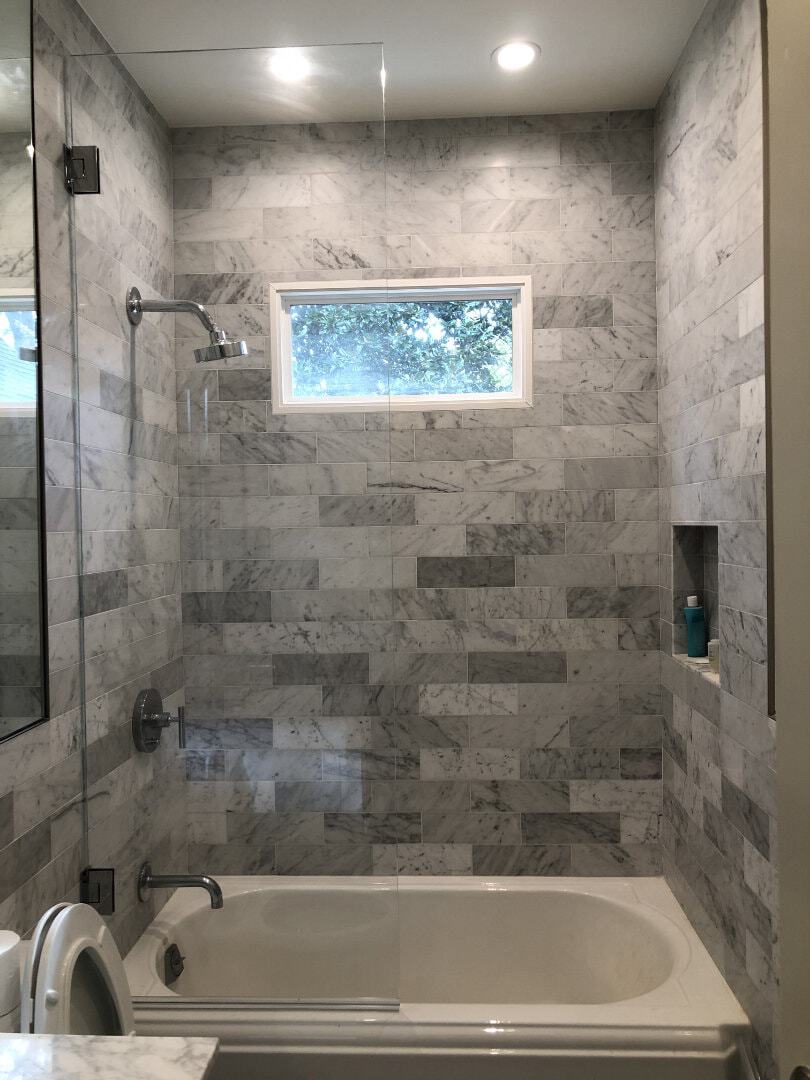 Swinging Shower Screen’. Great solution for a tub screen. The panel is hinged so it can open enough to make turning on the water easier. Also accessible for bathing children.