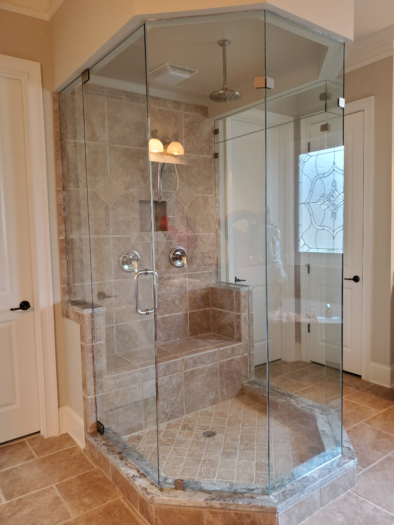 This is a five-sided steam shower with an operable transom above the panel on the other side of the enclosure. 